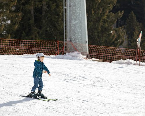 boy-at-the-ski-resort-learning-to-ski